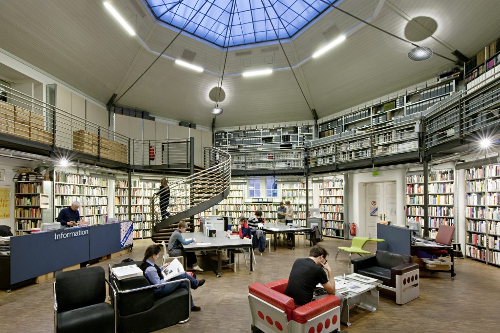 Interior of a library with bookshelves and reading areas