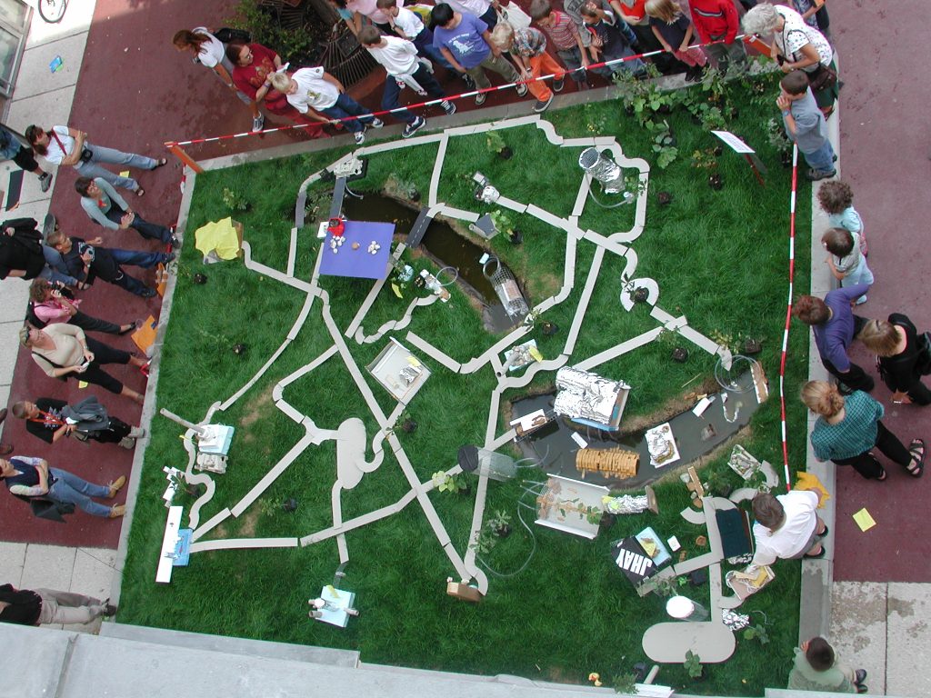 View of a model of the city with real lawn.