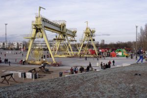 Square with building cranes