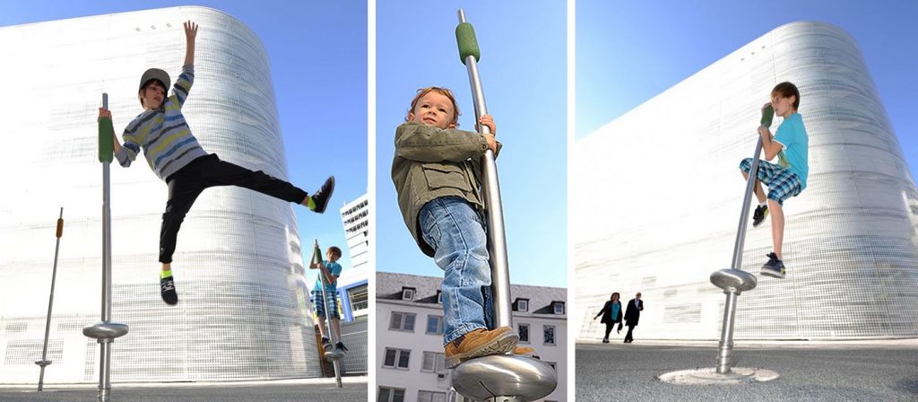 Boy using playground equipment