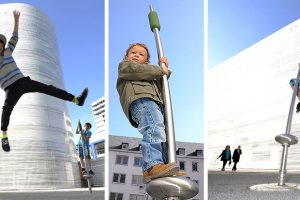 Boy using playground equipment