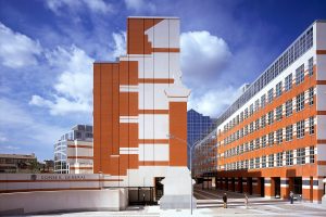 a orange and white building without windows