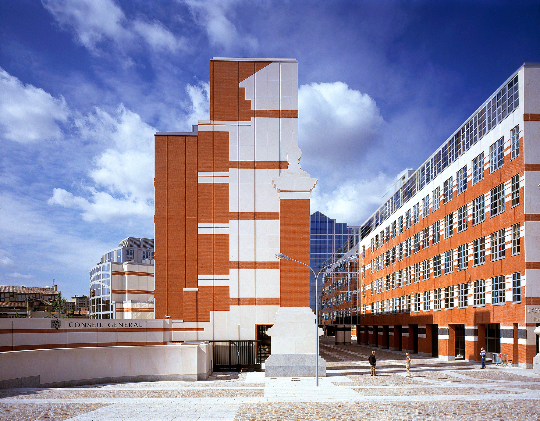 a orange and white building without windows