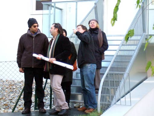 Gert Mayr-Keber explaining some sundays 182 participants the buidling, with Rohan Cherkoori
