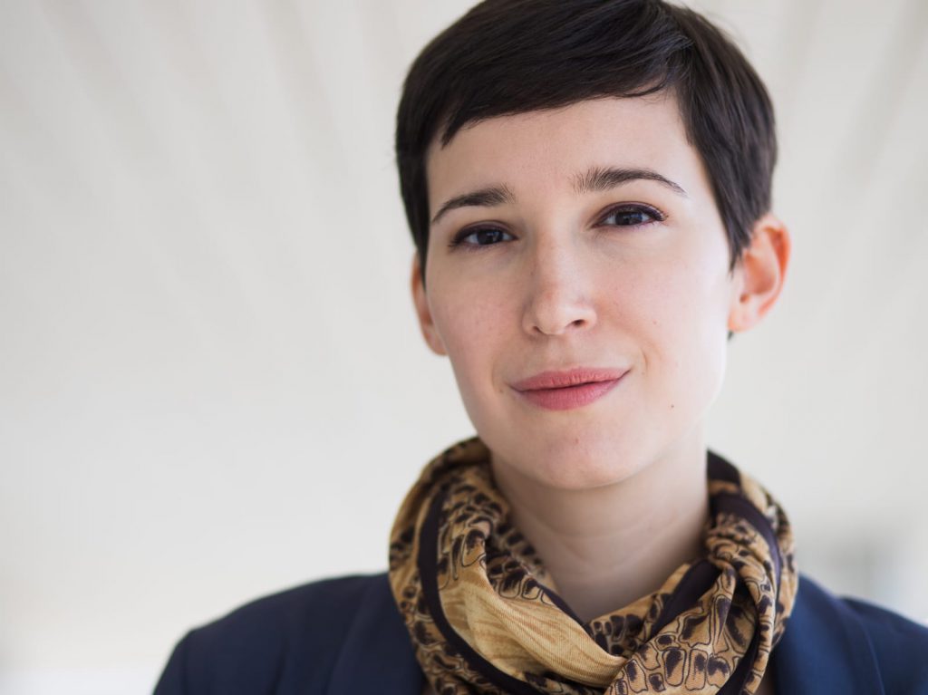 Portrait of a Woman with short hair and a scarf