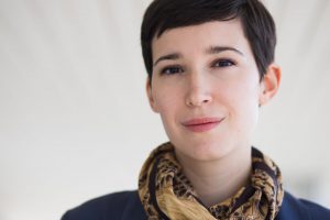 Portrait of a Woman with short hair and a scarf