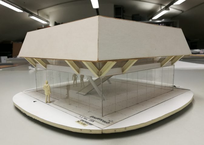Model of a glass pavilion with a flat roof