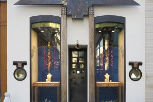 Shop entrance with shop windows, columns and ornaments