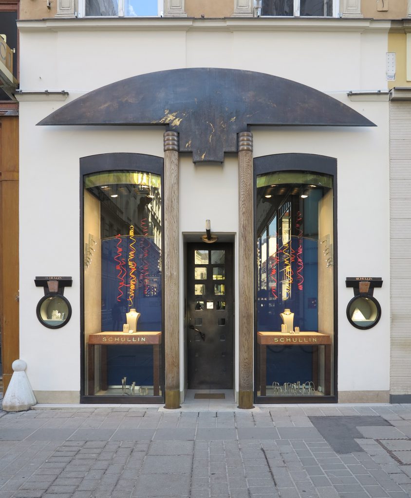 Shop entrance with shop windows, columns and ornaments