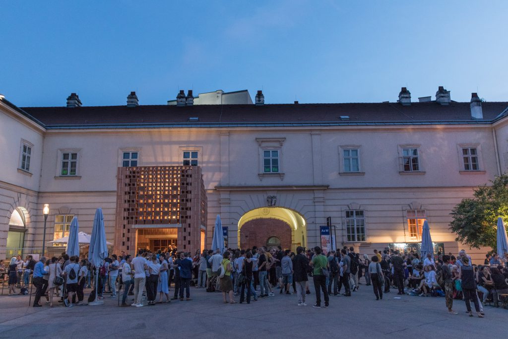 Crowd of people in a courtyard