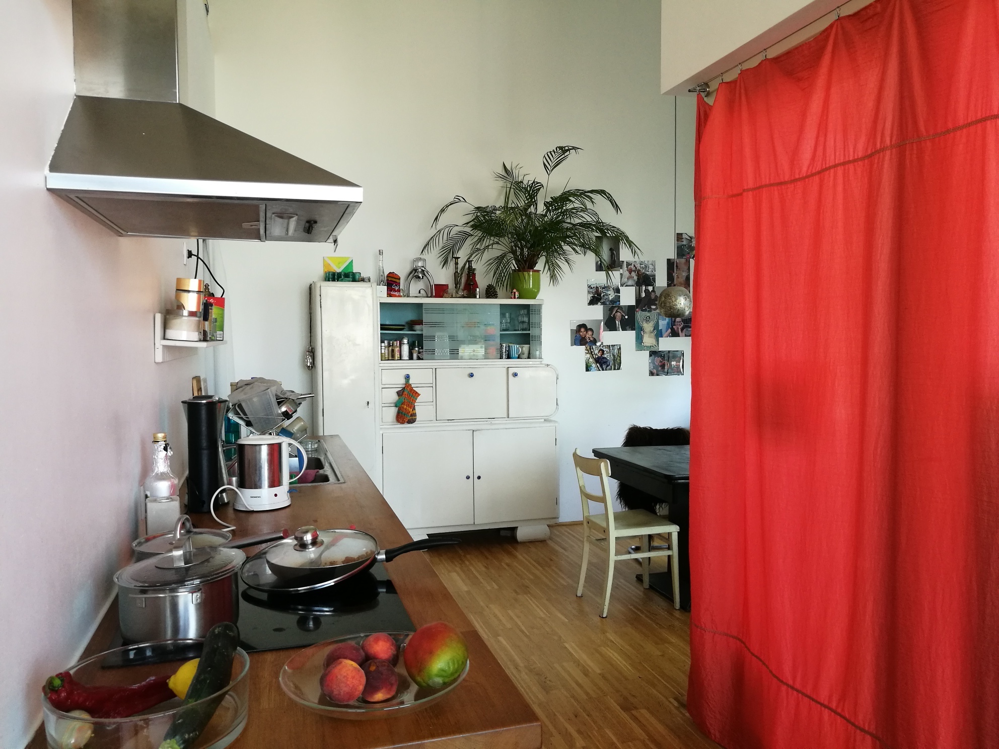 Kitchen with a red curtain