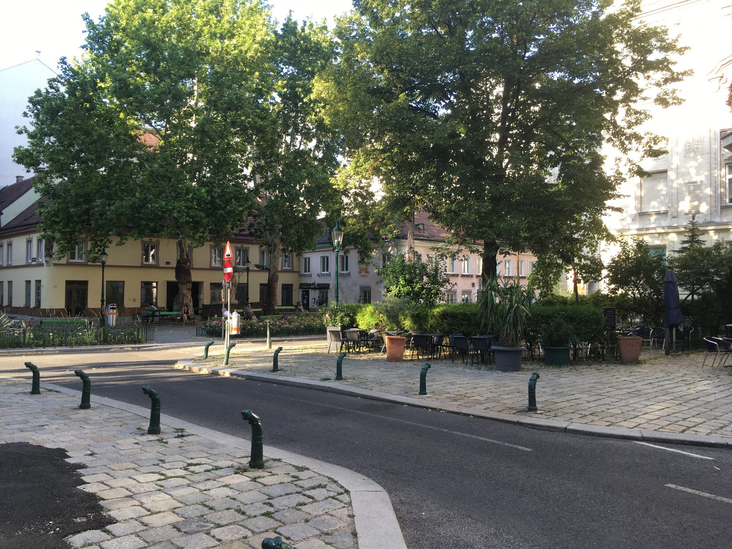 crossroads with squares and trees