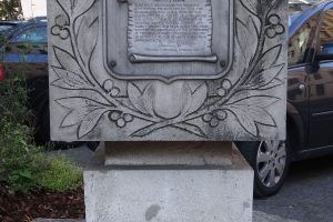 stone cube with inscription