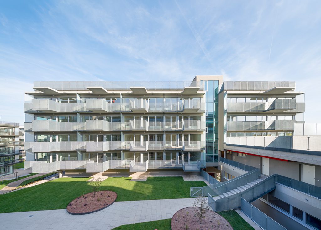 4-storey residential building with landscaped courtyard