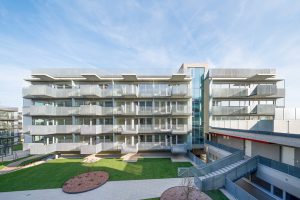 4-storey residential building with landscaped courtyard