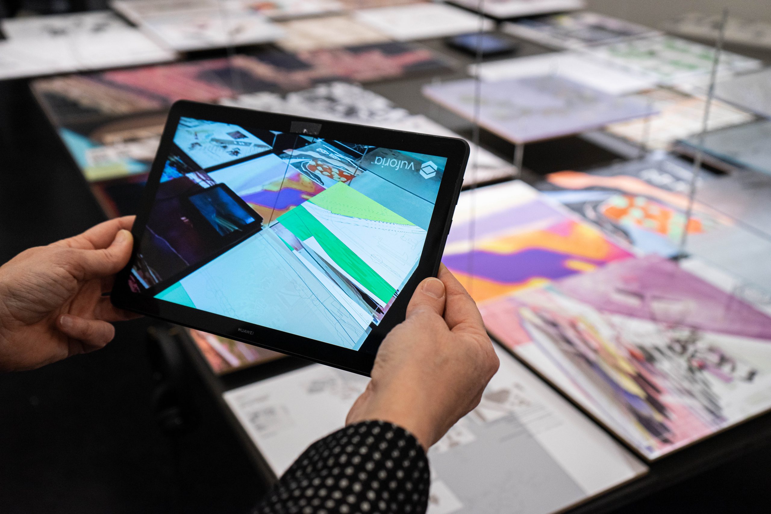 Person holding tablet