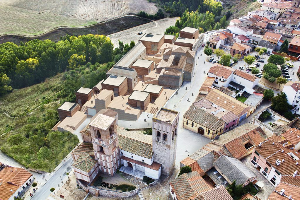 Small village with church seen from a bird's eye view