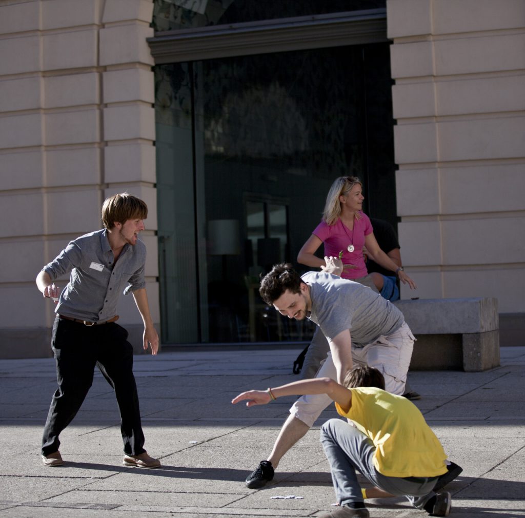 4 people on a court playing