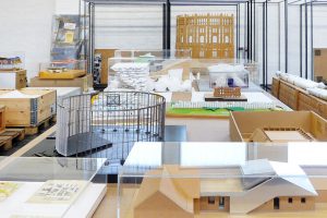 many architectural models in one room