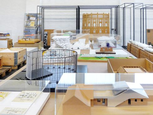 many architectural models in one room