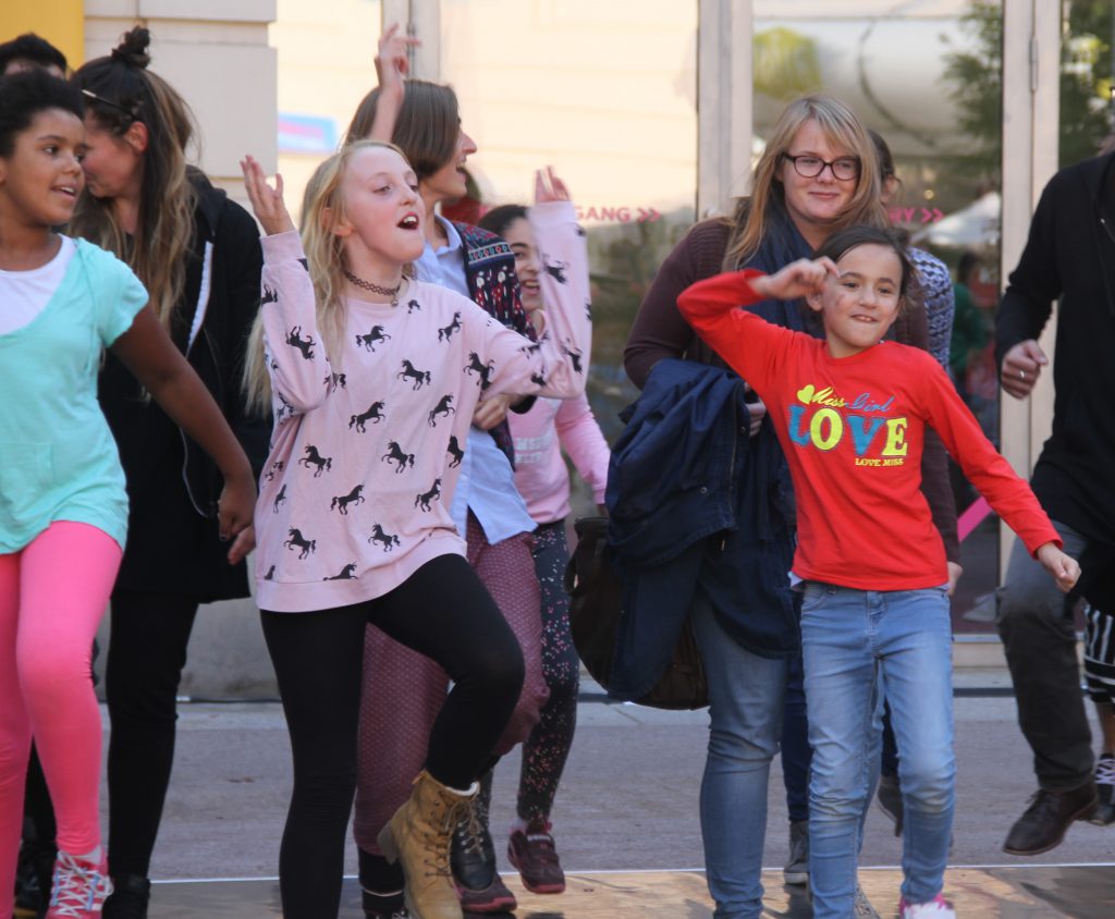 several children moving and dancing