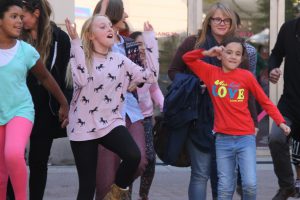 several children moving and dancing