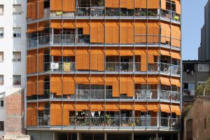 Multi-storey house with exterior wooden blinds