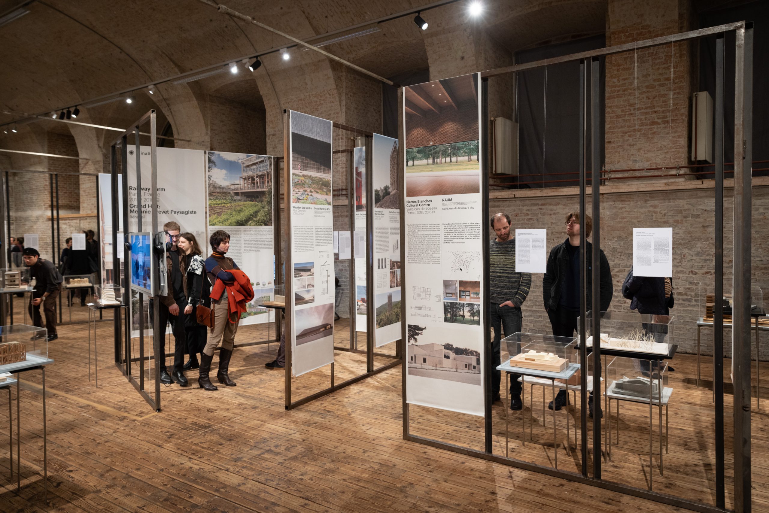 Exhibition designed from metal frames with tarpaulins over them