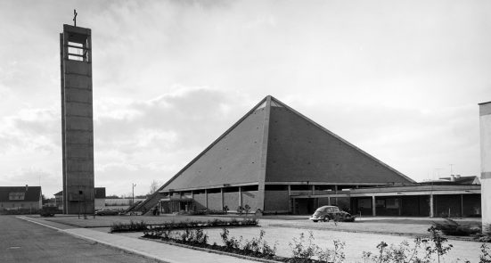 black and white picture of a modern church in tent form