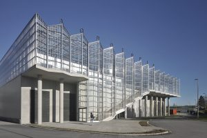 Building in zigzag shape with blue sky in the background