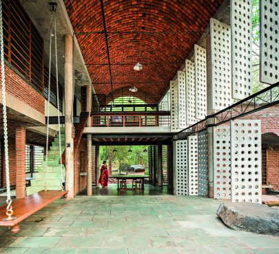 Building with a brick vault, stone floor, slabs with holes and a kind of swing to sit on