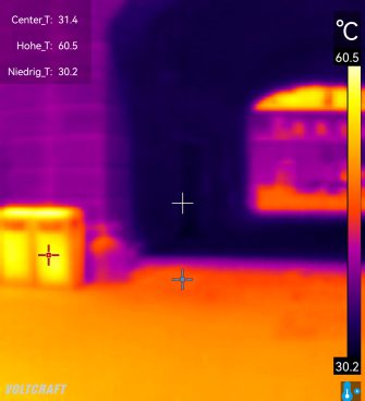 A purple-orange image with a temperature display on the right side of the screen and additional information